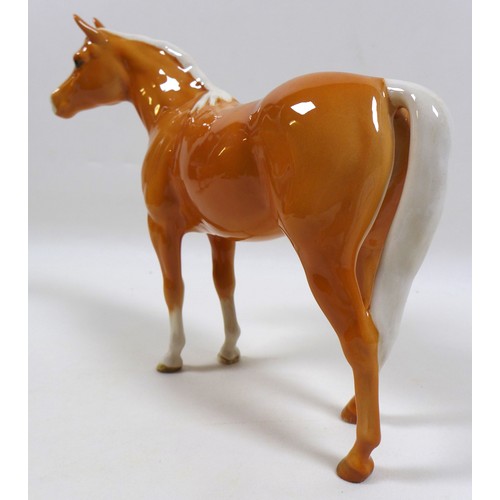 112 - Two Beswick palomino horse figurines, including 'Mare (facing left)', model 976, palomino - gloss, 1... 