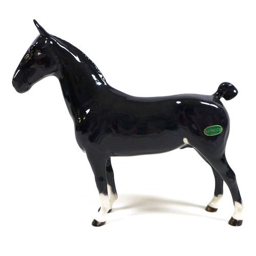 113 - A group of three Beswick horses, including 'Hackney - Black Magic of Nork', model 1361, black - glos... 