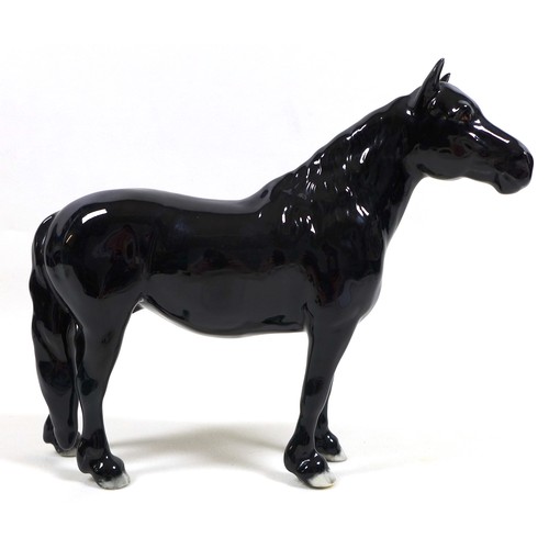 113 - A group of three Beswick horses, including 'Hackney - Black Magic of Nork', model 1361, black - glos... 