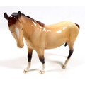 A limited edition Beswick 'Mare (Facing left)' in dun gloss colourway, one of 710 made, this model w... 