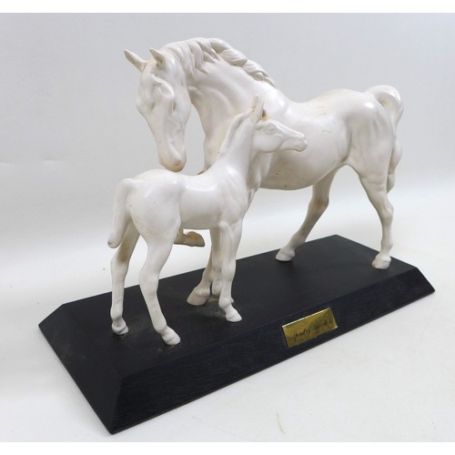 121 - A Beswick horse figurine 'Spirit of Affection', model 2689/2536, all white -matt colourway on a blac... 