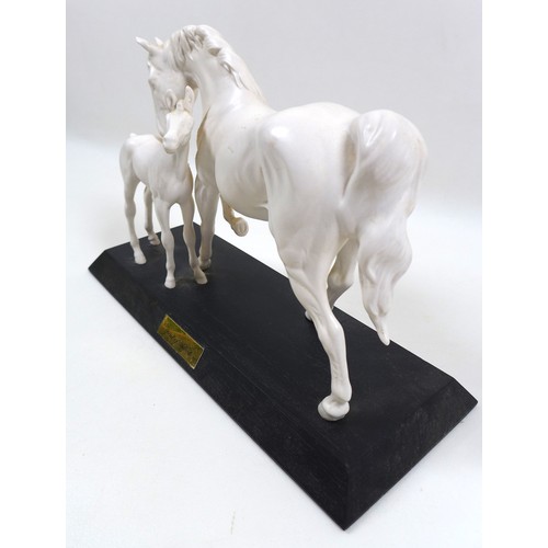 121 - A Beswick horse figurine 'Spirit of Affection', model 2689/2536, all white -matt colourway on a blac... 