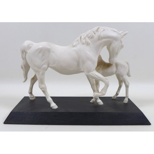 121 - A Beswick horse figurine 'Spirit of Affection', model 2689/2536, all white -matt colourway on a blac... 