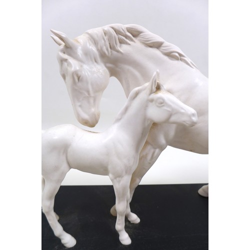 121 - A Beswick horse figurine 'Spirit of Affection', model 2689/2536, all white -matt colourway on a blac... 