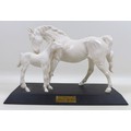 A Beswick horse figurine 'Spirit of Affection', model 2689/2536, all white -matt colourway on a blac... 