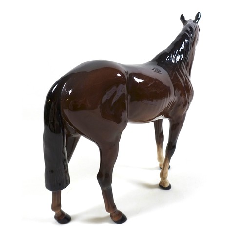 127 - A Beswick 'Large Racehorse' figurine, model number 1564, brown - gloss, 28.5cm high.