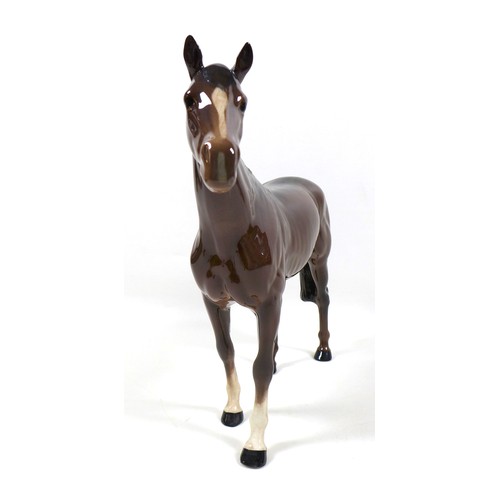 127 - A Beswick 'Large Racehorse' figurine, model number 1564, brown - gloss, 28.5cm high.