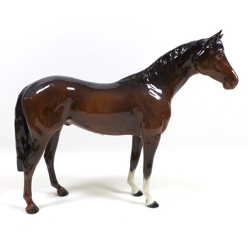 128 - A Beswick 'Large Hunter' horse figurine, First Version, model 1734, brown - gloss, 28.5cm high.