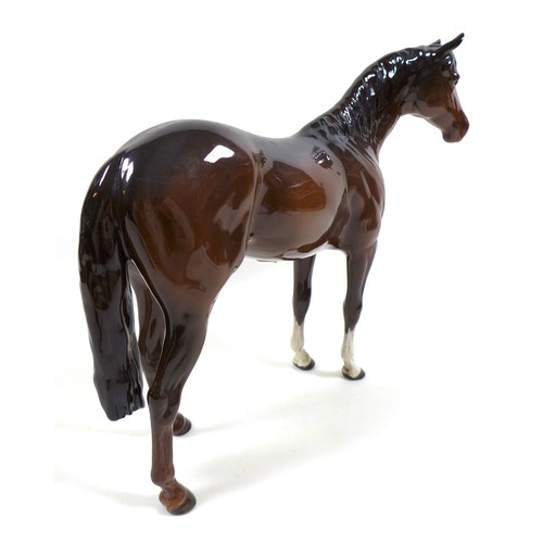 128 - A Beswick 'Large Hunter' horse figurine, First Version, model 1734, brown - gloss, 28.5cm high.