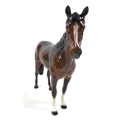 128 - A Beswick 'Large Hunter' horse figurine, First Version, model 1734, brown - gloss, 28.5cm high.