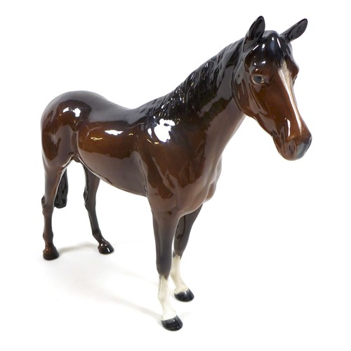 128 - A Beswick 'Large Hunter' horse figurine, First Version, model 1734, brown - gloss, 28.5cm high.