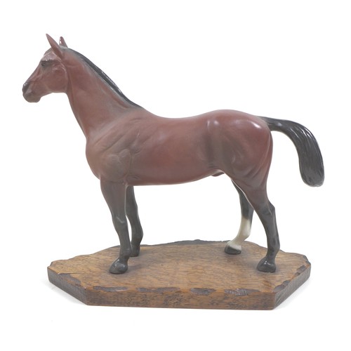 129 - A large Beswick horse, with short cropped tail and white rear left sock, bay - matt, 29cm high, stuc... 