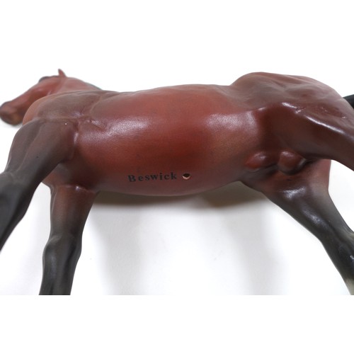 129 - A large Beswick horse, with short cropped tail and white rear left sock, bay - matt, 29cm high, stuc... 