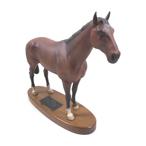 130 - A Beswick 'Nijinsky' horse figurine, from the 'Connoisseur Horses' series, model 2345, on wooden pli... 