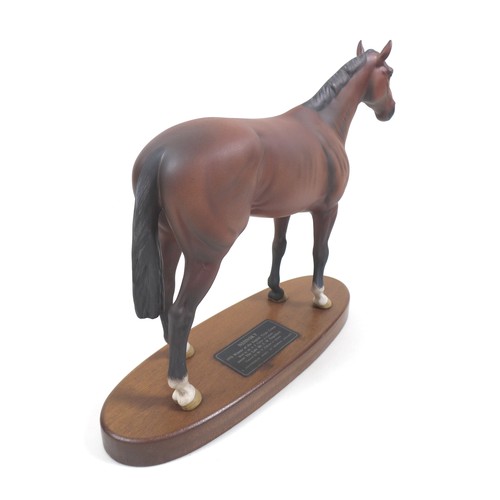 130 - A Beswick 'Nijinsky' horse figurine, from the 'Connoisseur Horses' series, model 2345, on wooden pli... 