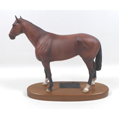 130 - A Beswick 'Nijinsky' horse figurine, from the 'Connoisseur Horses' series, model 2345, on wooden pli... 