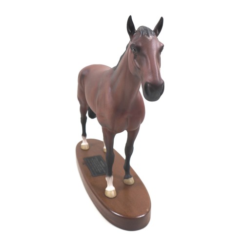 130 - A Beswick 'Nijinsky' horse figurine, from the 'Connoisseur Horses' series, model 2345, on wooden pli... 