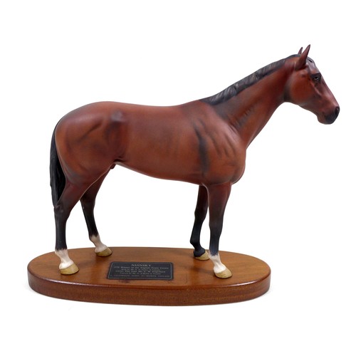 130 - A Beswick 'Nijinsky' horse figurine, from the 'Connoisseur Horses' series, model 2345, on wooden pli... 