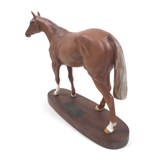 131 - A Beswick 'Grundy' horse figurine, from the 'Connoisseur Horses' series, model 2558, on wooden plint... 