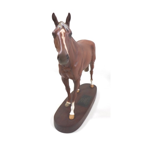 131 - A Beswick 'Grundy' horse figurine, from the 'Connoisseur Horses' series, model 2558, on wooden plint... 