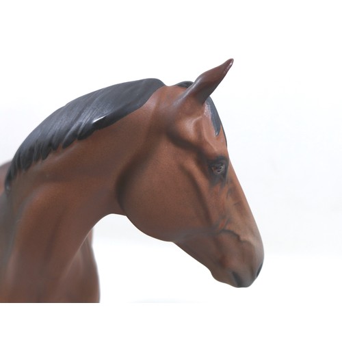 132 - A Beswick 'Troy' horse figurine, from the 'Connoisseur Horses' series, model 2674, on wooden plinth ... 