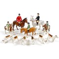 A Beswick Hunting Family Group, comprising 'Huntsman', style two, standing, model 1501, brown gloss,... 