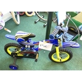 A Tiger NSR blue painted boy's bike, in the form of a motocross bike, with stabiliser wheels and mud... 