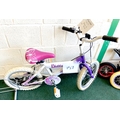 A Sunbeam (designed by Raleigh) Flutter white and purple painted girl's bike.