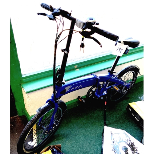 A Viking Gravity 20" Folding 24V 250W Electric Bike, blue, model VK506, boxed, with black handlebars and seats, flip stand, and two keys and charger, RRP: £549.99.