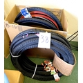 A group of bicycle tyres, including Duro and Schwalbe.