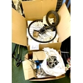 Two cardboard boxes containing a variety of bike parts, including a D.H.Disc wheel and rear gear ass... 