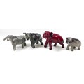 A group of elephants figurines, including a Beswick 'Elephant - Trunk stretching - small', model 974... 