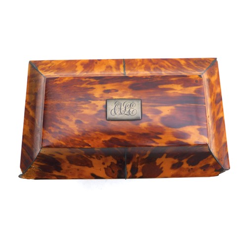 88 - A Georgian tortoiseshell twin division tea caddy, 18 by 10.7 by 14.8cm high.