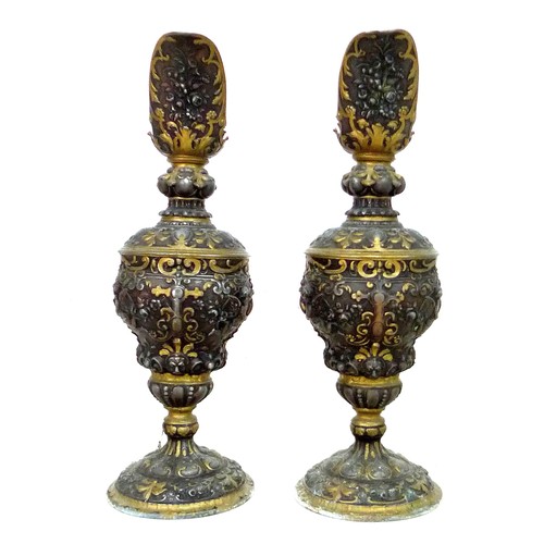 90 - A pair of early to mid 20th century metal ewers, a/f missing handles, in Italian style decorated in ... 