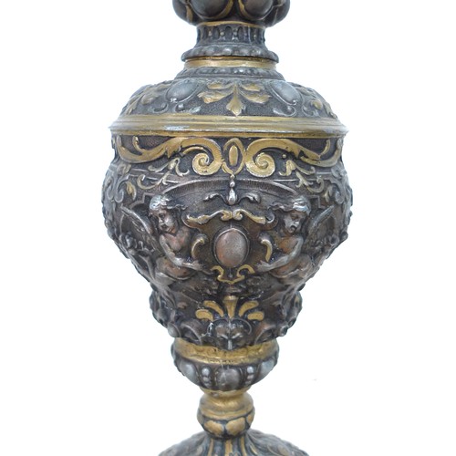 90 - A pair of early to mid 20th century metal ewers, a/f missing handles, in Italian style decorated in ... 