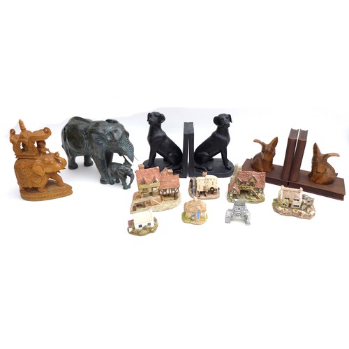 93 - A group of collectables, comprising a hardstone elephant, 28cm long, a wooden elephant, two pairs of... 