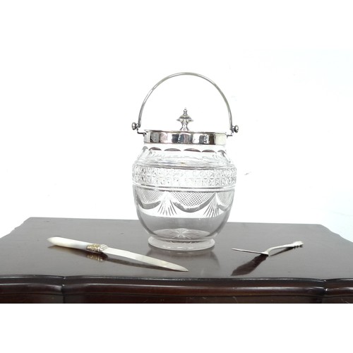 96 - A mahogany canteen of silver plated cutlery on stand, together with a cut glass ice bucket, and two ... 