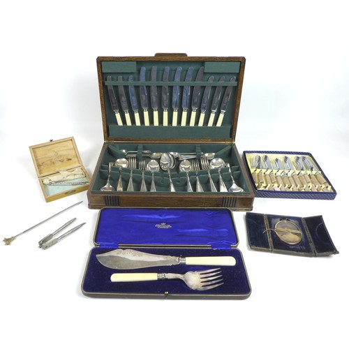 97 - A group of silver plated items, including an oak canteen of cutlery, together with an oval yellow me... 