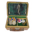 A group of militaria, including two sets of WWI medals, one group named Second Lieutenant R. S. Erns... 