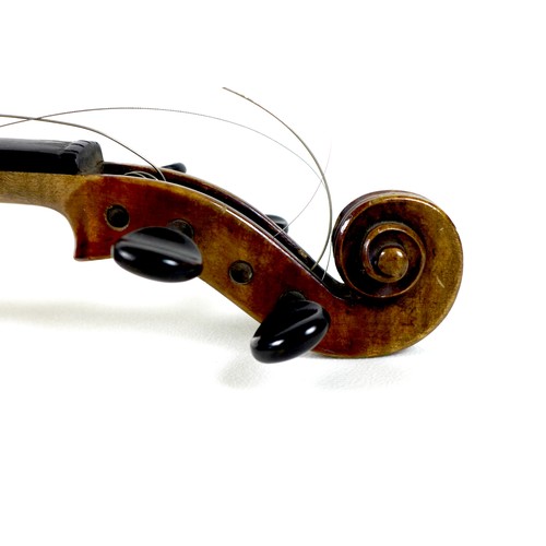 127 - An early 20th century German 3/4 violin, with ebonised fingerboard, tailpiece and tuning pegs, a/f d... 