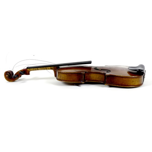 127 - An early 20th century German 3/4 violin, with ebonised fingerboard, tailpiece and tuning pegs, a/f d... 