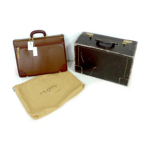 94A - An Italian tan leather briefcase, by Hugony, Palermo, with branded protective storage bag, together ... 