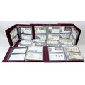 A large collection of Royal Mail GB FDCs and stamps, later 20th century, contained in seven burgundy... 