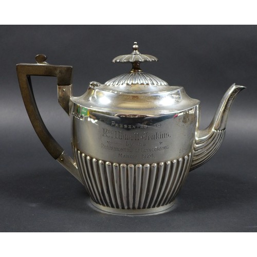 49 - A George V four piece silver tea service, all with half reeded lower bodies, comprising a teapot wit... 