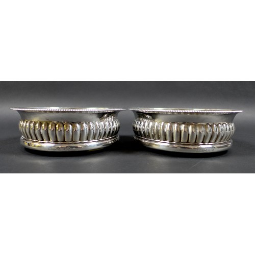 32 - A pair of George III silver wine bottle coasters, with beaded rims, John Roberts & Co, Sheffield 180... 