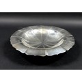 An Elizabeth II silver shallow footed bowl, of twelve lobed form with scalloped rim, S Blanckensee &... 