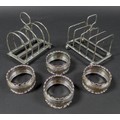 A group of Edwardian and later silver, comprising two silver toast racks, one Atkin Brothers, Sheffi... 