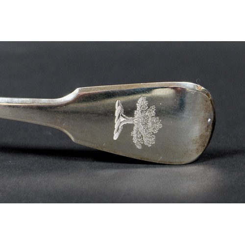 13 - A George III silver fish slice, with fiddle back pattern handle and decorated with pierced designed ... 