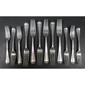 A set of twelve Edwardian silver rat tail pattern forks, comprising six table forks, 19.5cm long, an... 