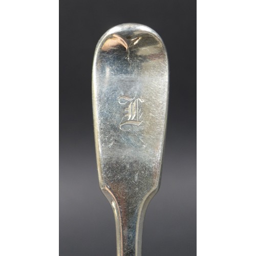 28 - Seven William IV and later silver fiddle back table forks, all with a single initial engraved to the... 